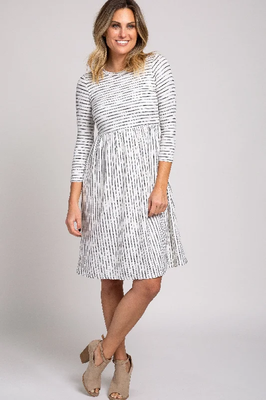 sleeveless dressIvory Ribbed Striped Pleated Midi Dress